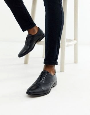 Черные кожаные туфли на шнуровке